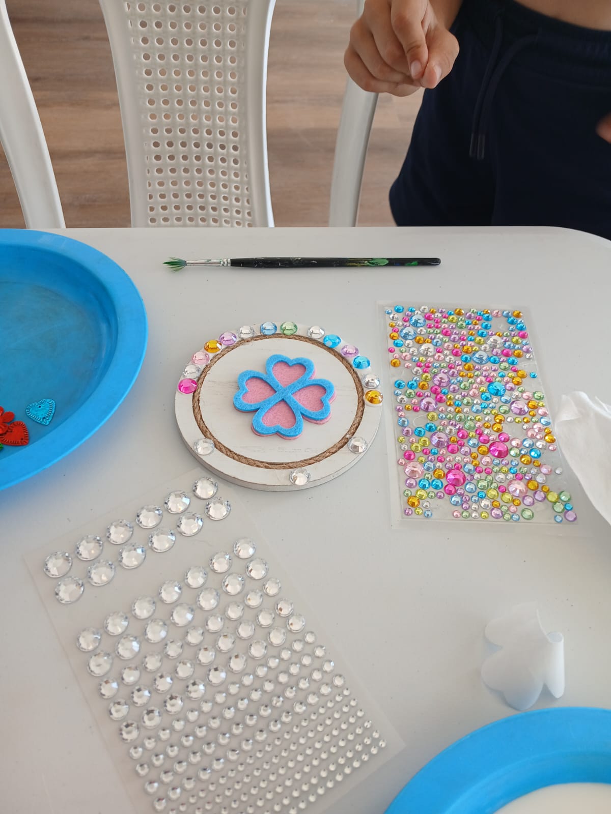Heart hoop craft in progress with colourful gems